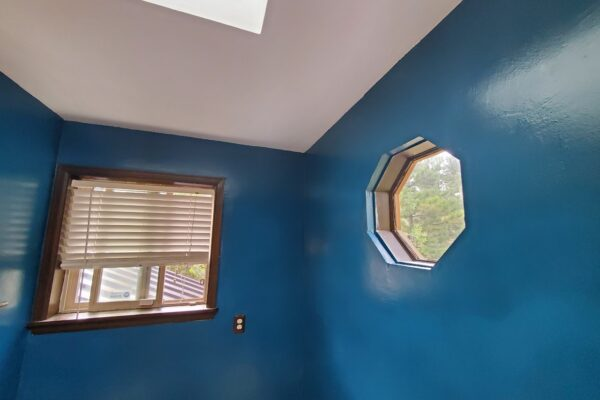 Bright blue interior with octagonal window